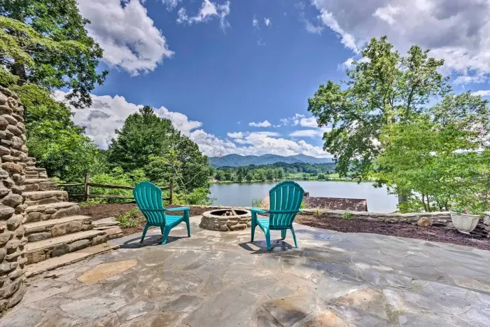 Imagine sitting here with this stunning view of the mountains, lake, and golf course all in one!