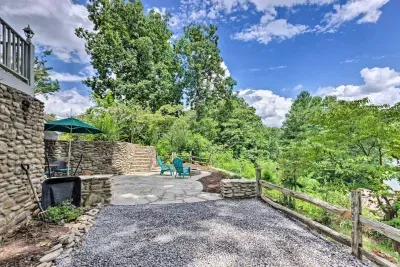 Arrive and unload with ease during your stay. The driveway pours right into the outdoor fire pit and entrance to your space.