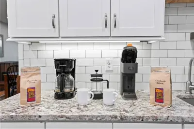 There is a drip-coffee maker, French Press, and a Keurig machine. Local, ground coffee from Panacea in Waynesville is supplied to all guests.