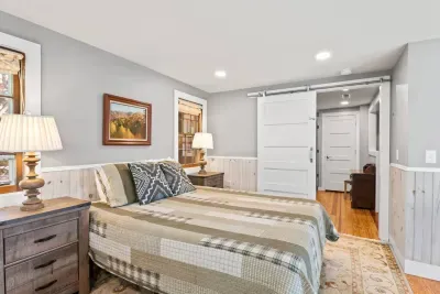 The upstairs bedroom is accessible through the bunk bedroom and is a great retreat for parents without being too far away.