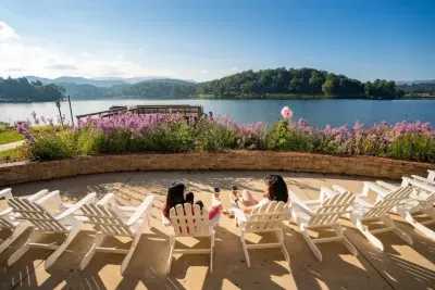Enjoy the beautiful mountain lake views while relaxing on rocking chairs lakeside!