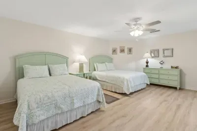 Store your luggage in the dresser or closet in this secondary bedroom!