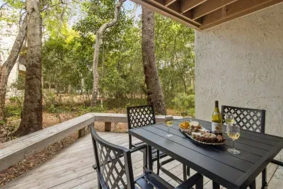 Picture yourself enjoying a beautiful charcuterie board and delicious wine while the greenery and shade surround you!