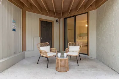 The secondary patio is accessible via the secondary bedroom and is a peaceful area to start your morning or end your evening!