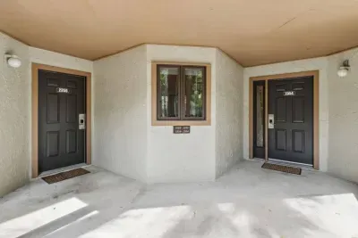 Enter the primary condo through the door on the right or separately access the secondary bedroom via the door on the left. Both sections of the condo can be separately locked off if needed.