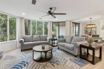 Take in the beautiful greenery surrounding the condo while you relax in the open concept family room. 