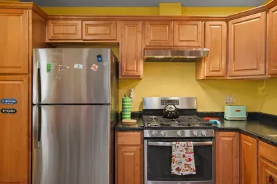 Everything you need for easy meals: a fully equipped kitchen with refrigerator, range, and dishwasher. Simple, functional, and ready for whatever you’re cooking up.