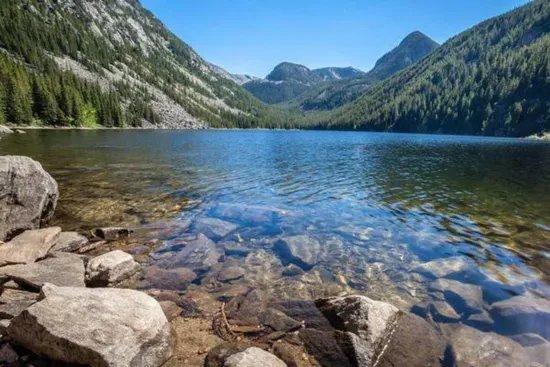 Lava Lake trail. A challenging 3 mile hike (each way) with an incredible payoff. Lava Lake is a pristine (and chilly) body of water, perfect for a quick dip or lakeside picnic. The Lava Lake trailhead is 24 miles from The Cabins at Wheat Ridge Farm.