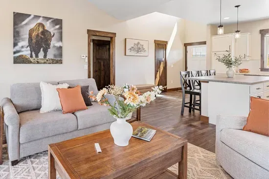 Stretch out on the comfy "Slofa" or one of two armchairs and enjoy the 55-inch Samsung Frame TV. This space was made for movie nights and quiet evenings by the fire.