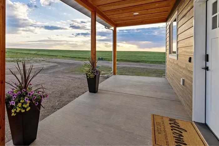 Enjoy coffee at sunrise and wine at sunset from your covered front porch or back deck, each with uninterrupted views of Montana’s open sky.