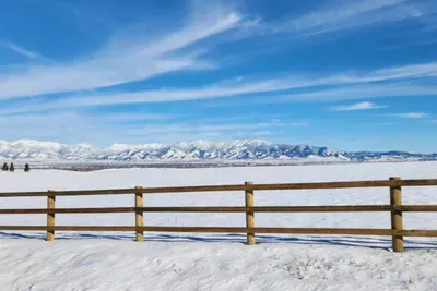 View from the back deck of the snow covered Bridger Mountains
