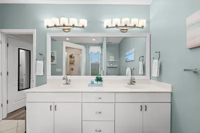 Spa-Like Bathroom: Refresh in this serene space with dual sinks and a walk-in shower!