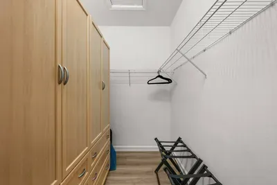 Walk-in Closet: Spacious storage for all your beach gear and vacation necessities!