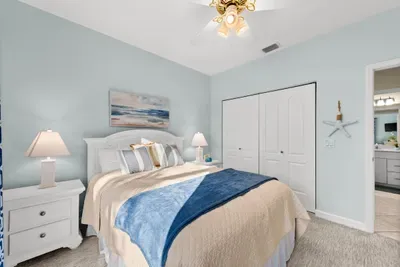 Bedroom Retreat: Bright and airy with beachy decor, perfect for restful nights and relaxation!
