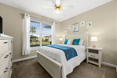 Bedroom Retreat: Enjoy bright views and stylish decor in this serene escape! Relax and recharge.