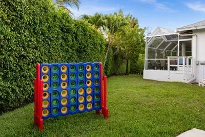 Outdoor Fun: Enjoy oversized games in your private garden paradise, perfect for family gatherings!