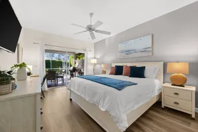 Master Bedroom: Retreat to serenity with a view, stylish decor, and bright natural light!