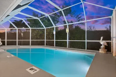 Indoor Pool Retreat: Dive into relaxation in this private pool with stunning sunset views!