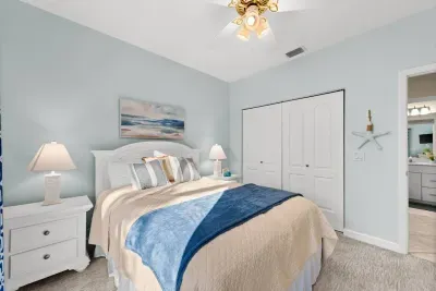 Bedroom Retreat: Bright and airy with beachy decor, perfect for restful nights and relaxation!