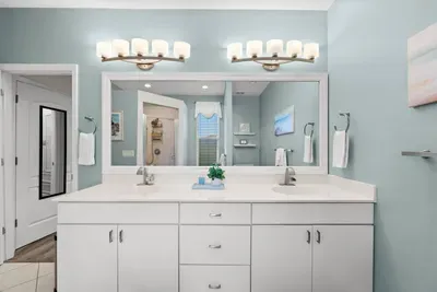 Spa-Like Bathroom: Refresh in this serene space with dual sinks and a walk-in shower!