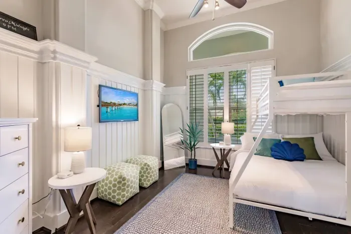 Bunk Room: Relax in style with vibrant decor, island views, and cozy charm for family fun!