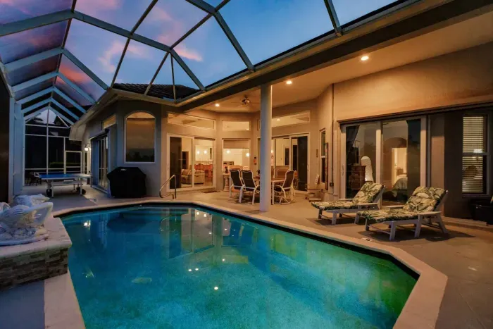 Outdoor Oasis: Unwind by the shimmering pool with stunning sunset views!
