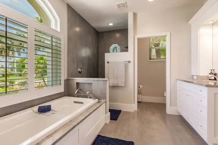 Luxurious Bathroom Retreat: Enjoy a spa-like experience with stunning views and sleek finishes!