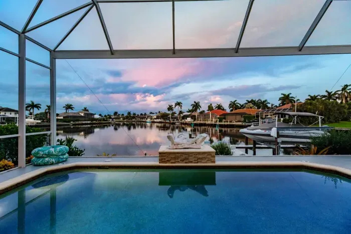 Outdoor Oasis: Dive into sunset views by the sparkling pool and unwind in paradise!