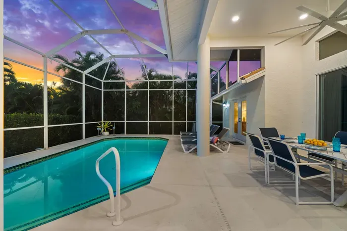 Poolside Retreat: Dive into relaxation beside your private pool, surrounded by lush tropical views!