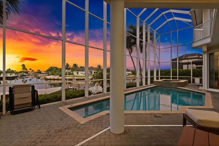 Private screened pool & spa with stunning waterfront sunset views