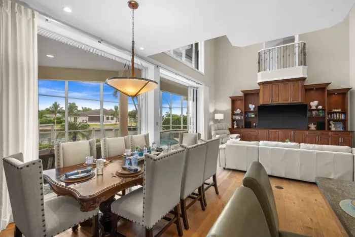 Spacious waterfront living with soaring ceilings and elegant dining area