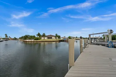 Private waterfront dock with peaceful canal views and boating access