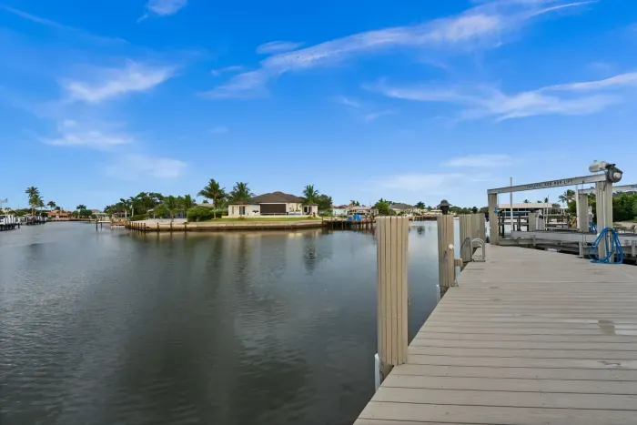 Private waterfront dock with peaceful canal views and boating access