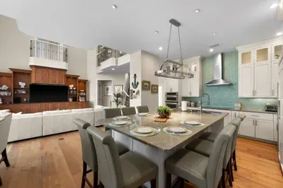 Spacious open-concept kitchen and living area with seating for six