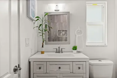 Bright modern bathroom with stylish vanity and fresh, clean finishes