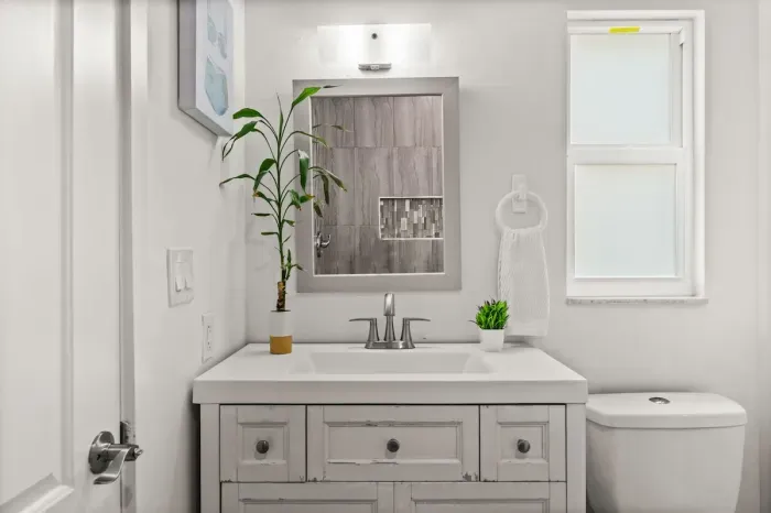 Bright modern bathroom with stylish vanity and fresh, clean finishes