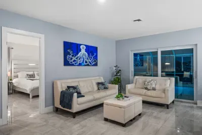 Modern coastal lounge with stylish seating and easy outdoor access