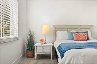 Bright, airy bedroom with coastal accents and natural light