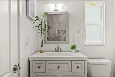 Bright modern bathroom with stylish vanity and fresh, clean finishes
