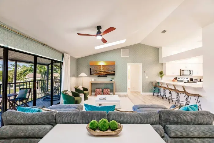 Living Room Retreat: Bright, airy space with stylish seating and stunning sunset views!