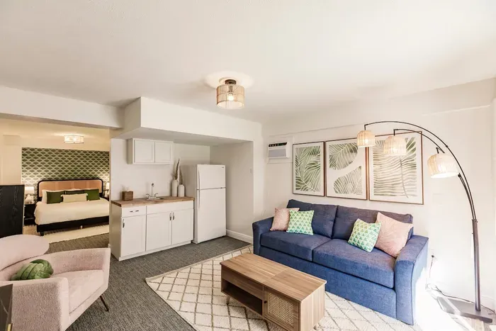 Bright and airy, with tropical decor and a comfy pull-out couch perfect for lounging!