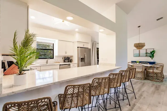Kitchen and Dining Area: Sleek design meets tropical flair—perfect for culinary adventures!