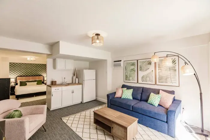 Bright and airy, with tropical decor and a comfy pull-out couch perfect for lounging!