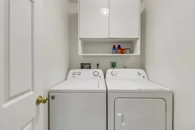 Laundry Room: Convenient in-unit washer and dryer for effortless beach day prep!