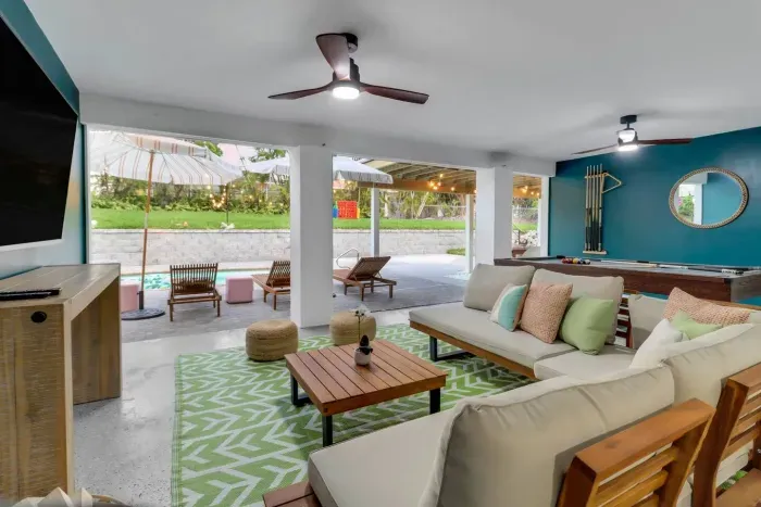 Game Room: Relax and play under the stars with poolside views and stylish decor!