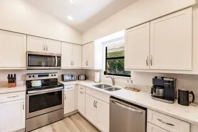 Kitchen: Culinary paradise with modern appliances and a sunny window view!