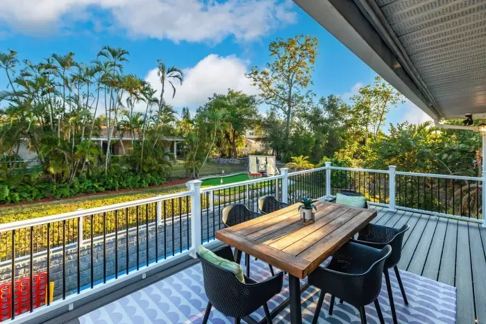 Outdoor Dining Delight: Enjoy alfresco meals with stunning views amidst lush Florida greenery!