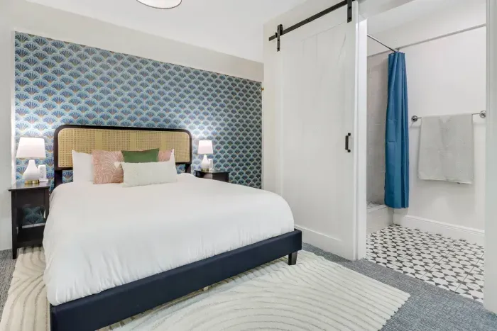 Bedroom Retreat: Stylish decor and vibrant colors create a cheerful escape for your Marco Island stay!