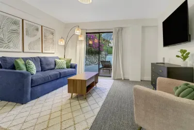 Chic elegance awaits you with vibrant decor and a view of blooming nature!