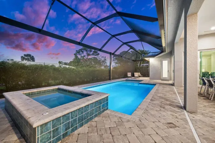 Outdoor Oasis: Dive into relaxation with your private pool and spa, framed by stunning sunset views!